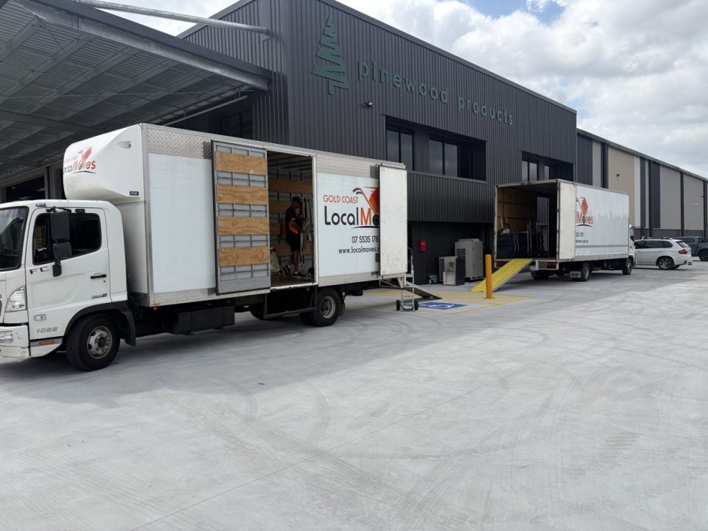Gold Coast Local Moves trucks completing a commercial office relocation on the Gold Coast